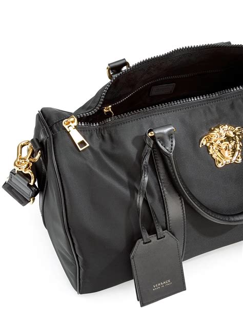 versace leather boutiques|Versace leather duffle bag.